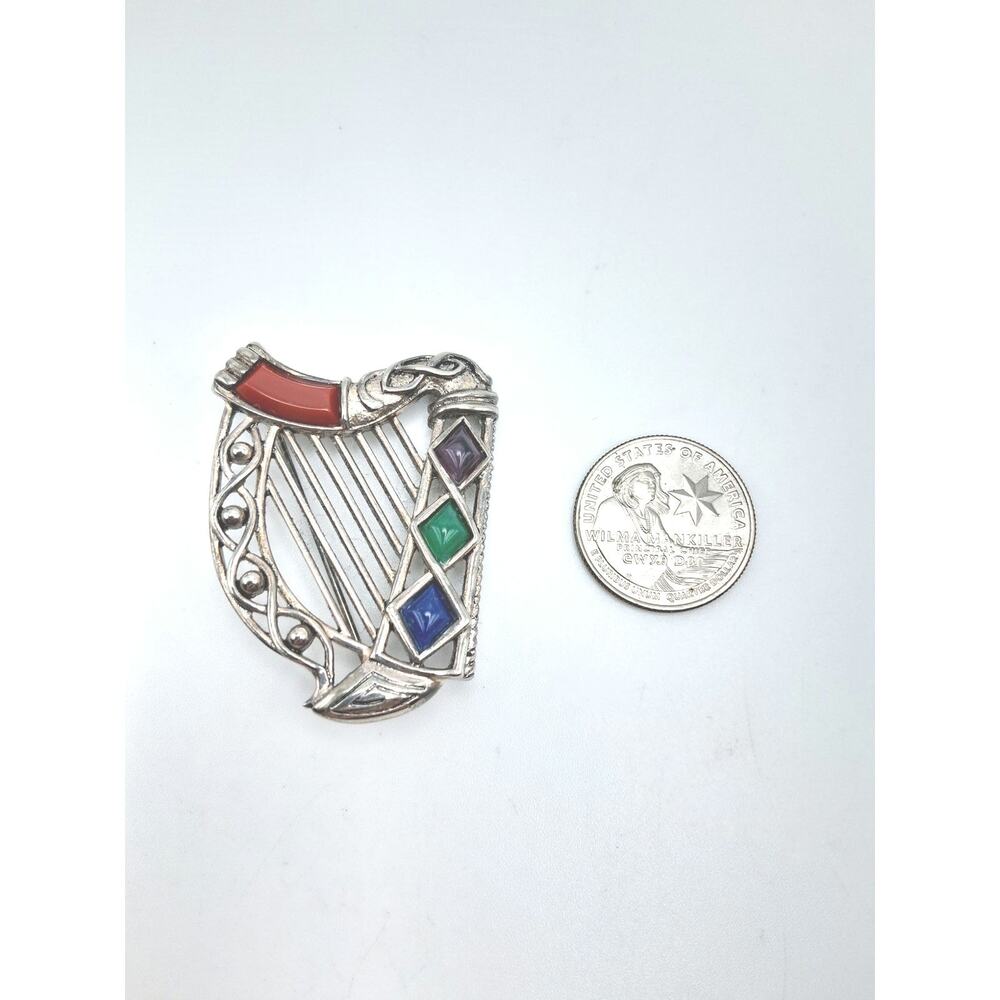 54.  Vintage Sol Dior harp brooch